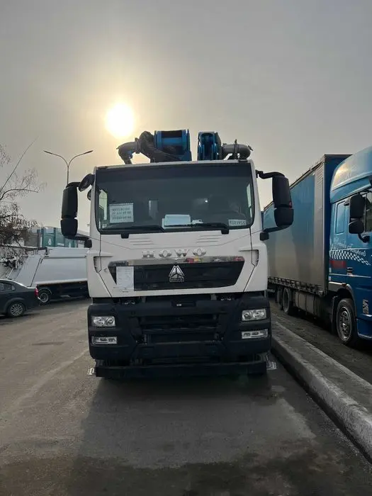Автобетононасос Howo Jiuhe JH52 а шасси HOWO TX (52 метр)